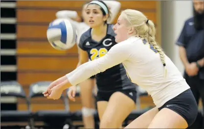  ?? Nikolas Samuels/The Signal ?? Caroline Page (23) of College of the Canyons hits the ball at a home match against Golden West College on Tuesday.