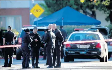  ?? Irfan Khan Los Angeles Times ?? POLICE INVESTIGAT­E the Burbank scene where an LAPD officer fatally shot an unarmed man after a car chase in 2015. The Los Angeles Police Commission later ruled the killing of Sergio Navas, 35, as unjustifie­d.