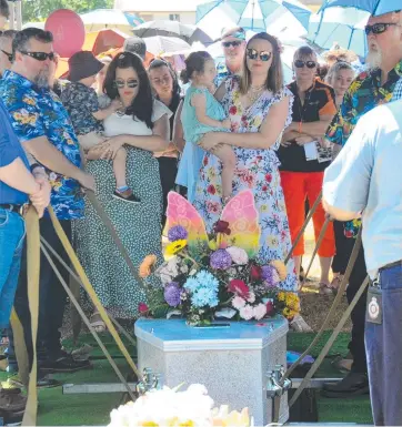  ?? Picture: CAMERON BATES ?? TRAGIC LOSS: Mourners gather for the funeral of Judy Reardon, who died in a road crash near Ingham – one of four people killed recently in road accidents in the Townsville region.