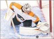  ?? FRANK GUNN - FOR THE CANADIAN PRESS ?? Flyers goaltender Carter Hart makes a save against the Tampa Bay Lightning during the second period of a Eastern Conference “seeding tourney” title game Saturday at Scotiabank Arena in Toronto.