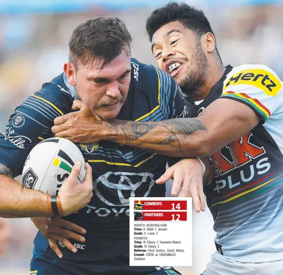  ?? Picture: GETTY IMAGES ?? The Cowboys’ Kyle Feldt is tackled by Penrith’s Waqa Blake during the Round 16 NRL match yesterday in Townsville