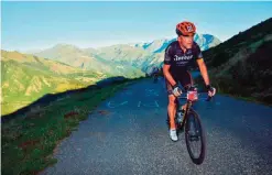  ??  ?? Photo shows Santiago Lyon makes his way up a climb during the 2016 Haute Route Pyrenees timed cycling event in France.