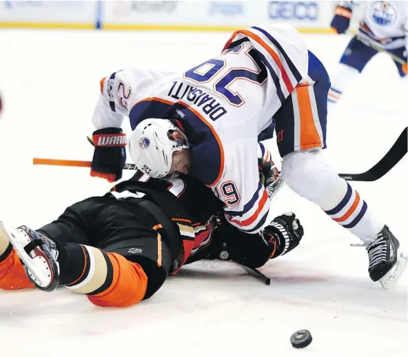  ?? — GETTY IMAGES FILES ?? Edmonton Oilers centre Leon Draisaitl, battling with Anaheim forward Ryan Getzlaf in Wednesday’s Game 1 of their second-round series, has been a Duck hunter all season and has nine goals and eight assists against the California club in 13 career games.