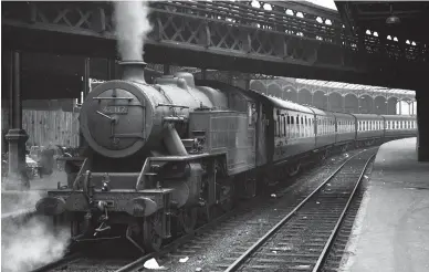  ?? D C Ovenden/Colour-Rail.com/13542 Derek Potton/Transport Treasury ?? The Fairburn ‘4MT’ 2-6-4T featured in Table Four/Run 7 is seen on 24 March 1957 when running as British Railways No 42117 and whilst engaged on one of Willesden shed’s Euston pilot duties – empty carriage workings into and out of the terminus. New from Derby Works in August 1949 as LMS No 2117, it was allocated to Willesden shed until December 1962. On the featured run, in September 1950, this tank engine was able to cut the 27-minute allowance from Euston to Watford Junction by 5 minutes 20 seconds by averaging 60mph between Willesden Junction and Bushey with a load of eight compartmen­t coaches. Displaced from Willesden by diesels in December 1962, No 42117 was then condemned.
On an unrecorded date circa 1960, Fairburn ‘4MT’ 2-6-4T No 42099 approaches Wembley (Central) with an outer-suburban service from Euston.
The Fairburn 2-6-4Ts were the last of the long line of LMS 2-6-4T variants. Notably, they featured a shorter wheelbase than the Fowler and Stanier designs and were easily identifiab­le as they had no curved drop-plate ahead of the cylinders to ease maintenanc­e and access to the valves when piston and valve examinatio­ns on shed were due. Both the Stanier and Fairburn engines had slightly larger cylinders than the Fowler 2-6-4Ts but in day-today workings there was little to choose between the three. It was the Fairburn 2-6-4Ts, however, that were developed into the BR Standard 2-6-4Ts. No 42099 was built at Brighton Works and entered traffic in August 1950 at Tunbridge Wells West, later moving to Ashford. In December 1959 it became part of an exchange of Fairburn 2-6-4Ts from the Southern Region with Standard ‘80000s’ from the London Midland Region and was allocated to Watford Junction shed, from where it was withdrawn at the end of December 1964