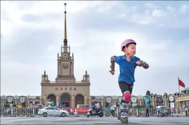  ?? SU DONG / FOR CHINA DAILY ?? A boy practices roller-skating at the Beijing Exhibition Center on Friday.