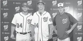  ?? COURTESY WASHINGTON NATIONALS ?? The Washington Nationals organizati­on boasts three men with Las Vegas ties — from left, outfielder Bryce Harper, pitching prospect Erick Fedde and manager Matt Williams.