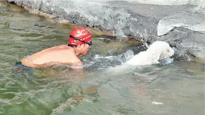  ??  ?? A man and his dog brave the winter cold in Beita Lake of Yinchuan, the capital city of northwest China’s Ningxia Hui Autonomous Region. — Photos/Xinhuanet