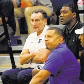  ?? Rachel Aston ?? Las Vegas Review-journal @rookie__rae Duke basketball coach Mike Krzyzewski watches the Compton Magic play Team Takeover in a Fab 48 tournament game July 25 at Bishop Gorman.