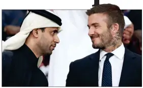  ??  ?? CLOSE FRIENDS: Beckham with Nasser-Al Khelaifi at a game in Qatar in 2019