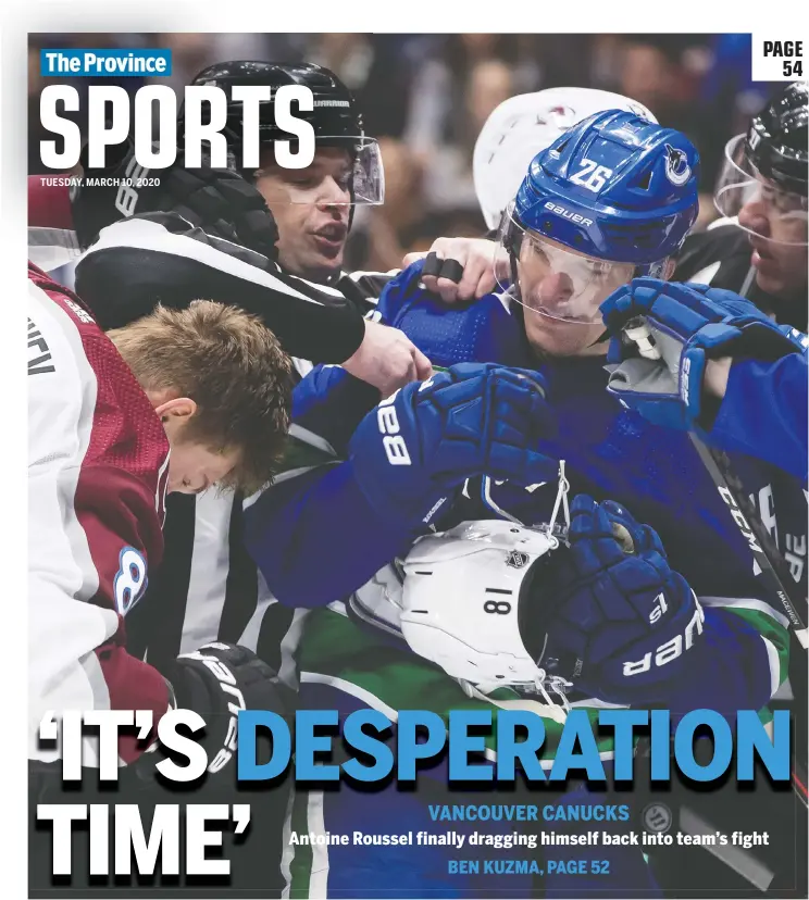  ?? — THE CANADIAN PRESS ?? The Canucks’ Antoine Roussel, right, pulls the helmet off of the head of Colorado Avalanche’s Vladislav Kamenev during NHL action in Vancouver on March 6.