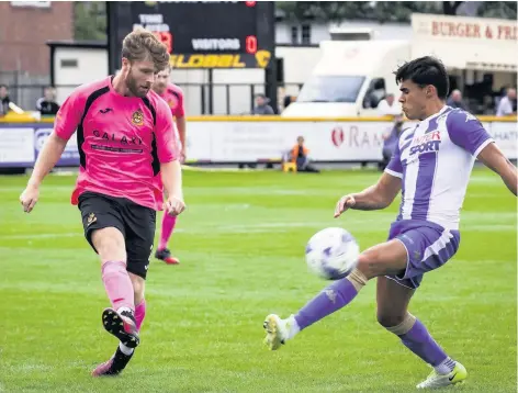  ?? Simon Marshall ?? Brad Jackson (left) scored Southport’s winner against Burscough