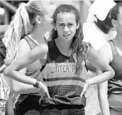  ?? CHARLES KING/ORLANDO SENTINEL ?? Rafaella Gibbons completed her career for Winter Park by winning the girls 4A 1,600-meter run in a tight race at UNF.