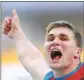  ?? MAXIM SHEMETOV / REUTERS ?? Dmitri Tarabin celebrates winning bronze in the javelin final on Saturday.