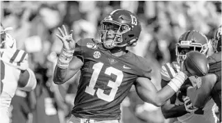  ?? VASHA HUNT/AP ?? Alabama’s Tua Tagovailoa, looking to pass against Mississipp­i on Sept. 28, has agreed to his rookie contract.
