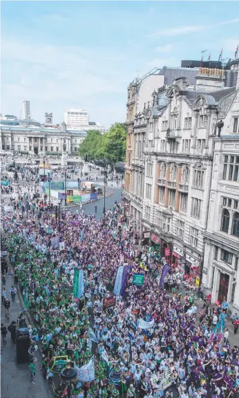  ?? Picture: GETTY IMAGES ?? Women take to the streets of London as part of a celebratio­n of 100 years of votes for women. Their counterpar­ts in Belfast, Cardiff and Edinburgh also took part.
