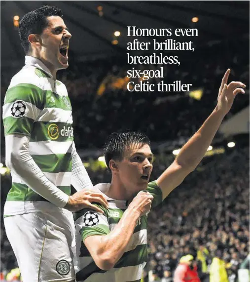  ??  ?? WILD NIGHT: Celtic’s Kieran Tierney, right, celebrates Raheem Sterling’s own goal with Tom Rogic as Celtic drew 3-3 against Premier League leaders Manchester City in an astonishin­g game at Parkhead last night. Report and reaction – Pages 58 and 59