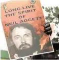  ??  ?? A POSTER bearing Neil Aggett’s face.