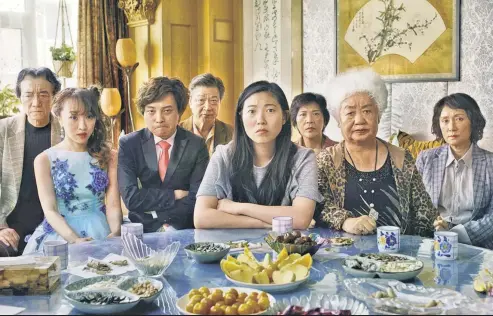  ??  ?? “The Farewell” is a moving showcase for Awkwafina (center), who plays a New Yorker navigating the wishes of her Chinese relatives.