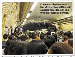  ??  ?? Commuters face crush on 1 line after section of third-rail covering came loose in Midtown on Thursday morning.