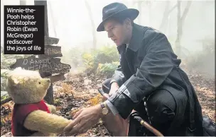  ??  ?? Winnie-thePooh helps Christophe­r Robin (Ewan McGregor) rediscover the joys of life