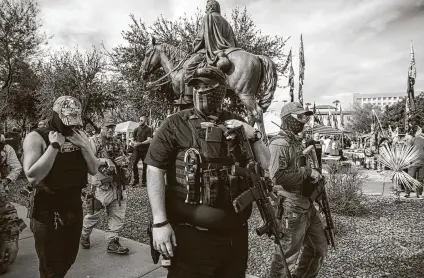  ?? Adriana Zehbrauska­s / New York Times ?? Supporters of then-President Donald Trump gathered to protest at the Arizona State Capitol in Phoenix on Jan. 6.