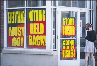  ?? RICK BOWMER — THE ASSOCIATED PRESS ?? Store closing signs are shown on a Stein Mart store Sunday, Aug. 30, 2020, in Salt Lake City.