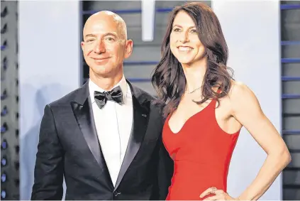  ??  ?? Rich pickings: Jeff and MacKenzie Bezos are divorcing – and the future of their vast fortune is now up for grabs