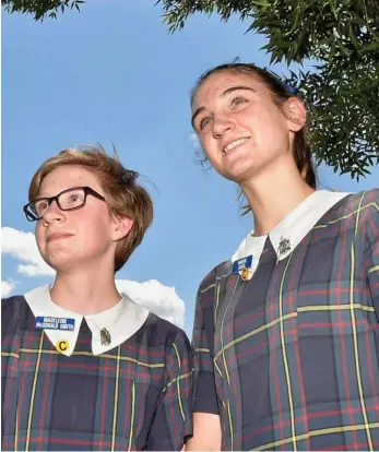  ?? PHOTOS: BEV LACEY ?? OUTER SPACE: Fairholme College students Maddie McDonald Smith (left) and Maggie Grigg went to NASA as part of a camp for youth astronauts.