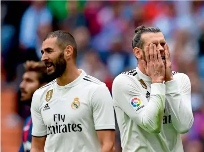  ?? AFP ?? Real Madrid’s Gareth Bale (right) reacts next to Karim Benzema during the Spanish league match against Levante. —