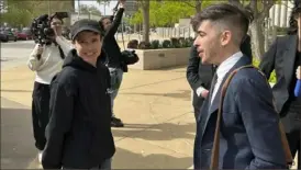  ?? Jim Salter/Associated Press ?? The federal appeals court is hearing arguments over Arkansas' first-inthe-nation ban on gender-affirming care for minors Thursday in St. Louis. Actor Elliot Page, left, was at the hearing in support of the ACLU’s challenge to the law.