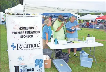  ??  ?? Chamber board members volunteere­d to offer assistance to patrons and vendors alike at the 42nd annual Homespun Festival in Rockmart on July 19.