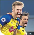  ??  ?? Former Celtic midfielder Stuart Armstrong celebrates scoring the second of his two goals for Saints