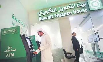  ??  ?? Kuwait Finance House is working with Credit Suisse Group AG to consider strategic alternativ­es for the Malaysian business, the people said, asking not to be identified as the process is private. — AFP photo