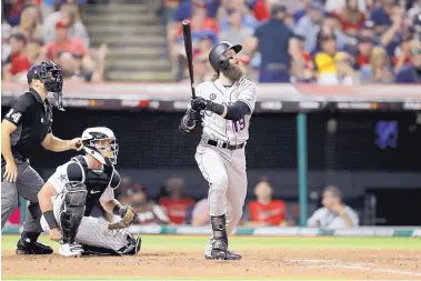  ?? TONY DEJAK/ASSOCIATED PRESS ?? Charlie Blackmon of the Colorado Rockies (19) launches a home run in the sixth inning for the National League. His blast shaved the AL’s lead in the game to 2-1.