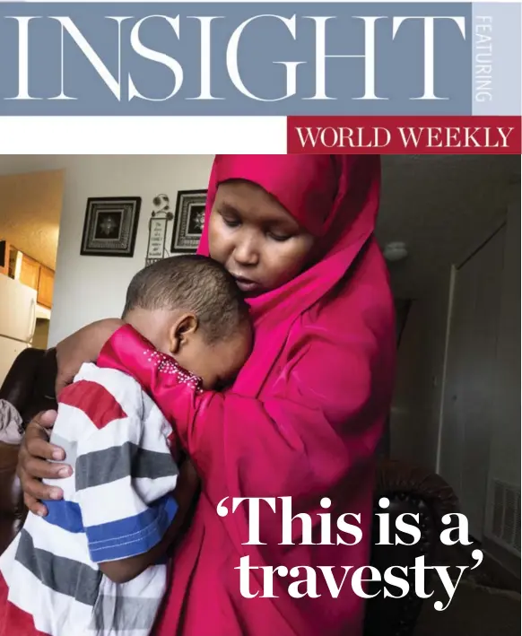  ?? COURTNEY PERRY FOR THE WASHINGTON POST ?? Suaado Salah comforts her 3-year-old son at their apartment in suburban Minneapoli­s. Luqman and his 18-month-old sister got measles during Minnesota’s current outbreak.