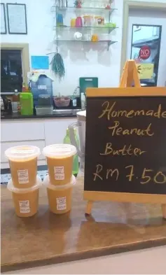  ??  ?? Home- made peanut butter is now on sale at Hehe Haha Café.