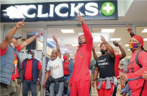  ?? | HENK KRUGER African News Agency (ANA) ?? EFF supporters protest outside a Clicks outlet in the city, calling for the closure of its stores as part of a 5-day national shutdown.