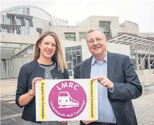  ??  ?? Jenny Gilruth, MSP for Mid Fife and Glenrothes, with Eugene Clarke, chairman of Levenmouth Rail Campaign.