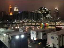  ?? Haddad’s Inc. ?? This collection of trailers provided by Haddad’s Inc. sits on the lot of a movie shoot taking place at The Banks in Cincinnati.