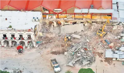  ??  ?? An overview of the municipal building damaged in an earthquake. — Reuters photo