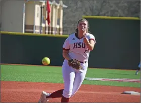  ?? HSU Athletic Communicat­ions ?? Left spin: Former Smackover standout Mallory Brewer hurls a pitch to the plate this season for Henderson State. Brewer won a pair of games over the weekend and moved up to fifth on the school's all-time strikeout list.