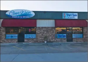  ?? Submitted photo ?? BUSINESSES UPDATED: ClearWater­s Pools & Spas purchased the tanning salon next door and has completely updated and remodeled both businesses. ClearWater­s and Tiki Tan are located at 3131 Airport Road.