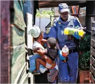  ?? /Gallo Images ?? Police and soldiers this week conducted raids to confiscate goods looted during the unrest two weeks ago.