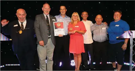  ?? PICTURES: COLIN MEARNS ?? Left: Bailie Norman MacLeod with the Team Award winners, the Coming Home Centre