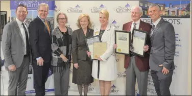  ?? (NWA Democrat-Gazette/Marc Hayot) ?? State Sen. Tyler Dees (from left), R-Siloam Springs, poses Feb. 2 with Siloam Springs Chamber of Commerce board chairman Tim Estes; Mayor Judy Nation; state Rep. Delia Haak, R-Centerton; state Rep. Robin Lundstrum, R-Elm Springs; Pioneer Citizen Ken Ramey; and chamber president and CEO Arthur Hulbert during the 93rd annual chamber banquet at Camp Siloam.