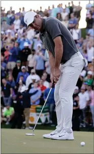  ?? DARRYL WEBB — THE ASSOCIATED PRESS ?? Scottie Scheffler putts on the 18th hole during the third round of the Phoenix Open golf tournament, Saturday, Feb. 11, 2023, in Scottsdale, Ariz. Scheffler leads the