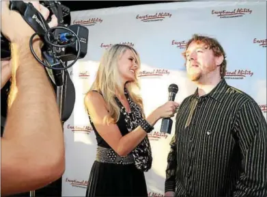  ?? COURTESY PHOTO ?? Dan Sinclair, right, is interviewe­d last year at the Exceptiona­l Ability Awards in Los Angeles.