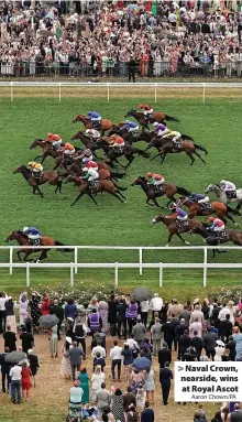  ?? Aaron Chown/PA ?? > Naval Crown, nearside, wins at Royal Ascot