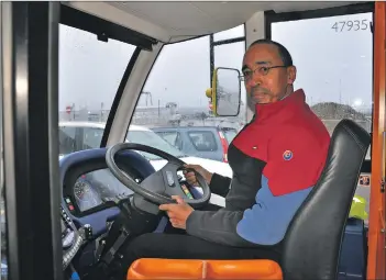  ?? 01_B03mybus02 ?? The MyBus driver Michael Stewart in his cab.