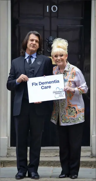  ?? Picture: JONATHAN BUCKMASTER ?? CARE SCANDAL: Scott Mitchell with wife Dame Barbara at Downing Street